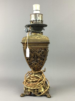 Lot 84 - A VICTORIAN GILDED BRASS OIL LAMP WITH BRASS CANDLESTICKS