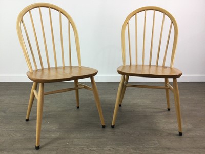 Lot 336 - AN ERCOL CIRCULAR BREAKFAST TABLE AND FOUR CHAIRS