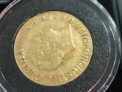 Lot 54 - A GEORGE III GOLD SOVEREIGN DATED 1817