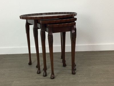 Lot 366 - A MAHOGANY  OVAL TABLE AND A NEST OF THREE TABLES