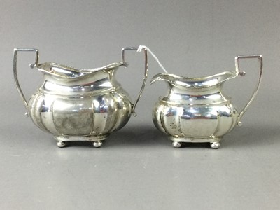 Lot 115A - A SILVER AND PARCEL GILT SUGAR AND CREAM