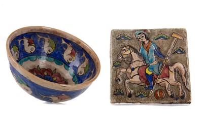 Lot 1186 - A QAJAR POTTERY TILE AND BOWL