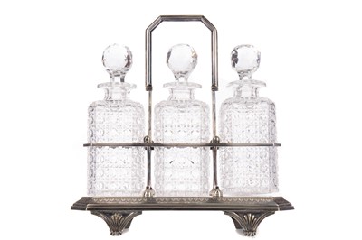 Lot 169 - A SILVER PLATED THREE DIVISION DECANTER STAND