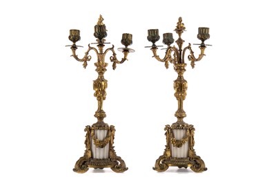 Lot 422 - A PAIR OF CAST GILT METAL AND ALABASTER CANDELABRA