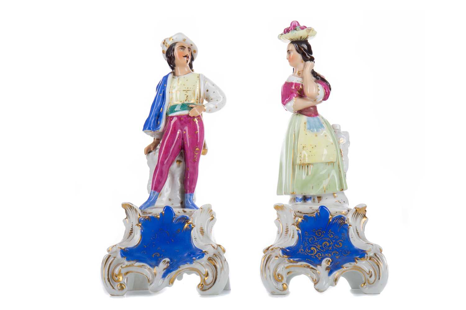 Lot 808 - A PAIR OF 19TH CENTURY CONTINENTAL CERAMIC FIGURAL TAPER STANDS