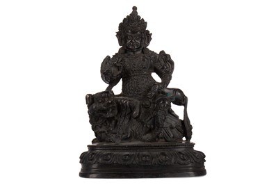 Lot 1206 - A BRONZED METAL VAISHRAVANA ‘TREASURE KING’ BUDDHA AND A BELL