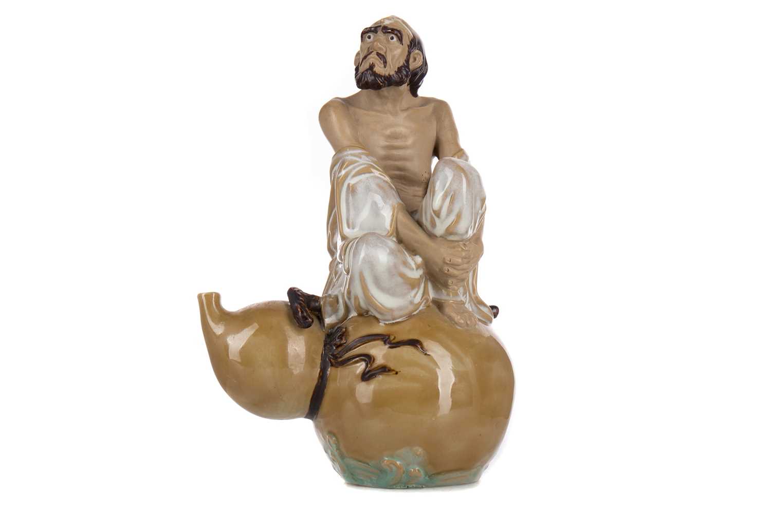 Lot 373 - A CHINESE POTTERY FIGURE