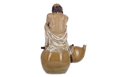 Lot 373 - A CHINESE POTTERY FIGURE