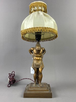 Lot 216 - A BRONZED FIGURAL TABLE LAMP