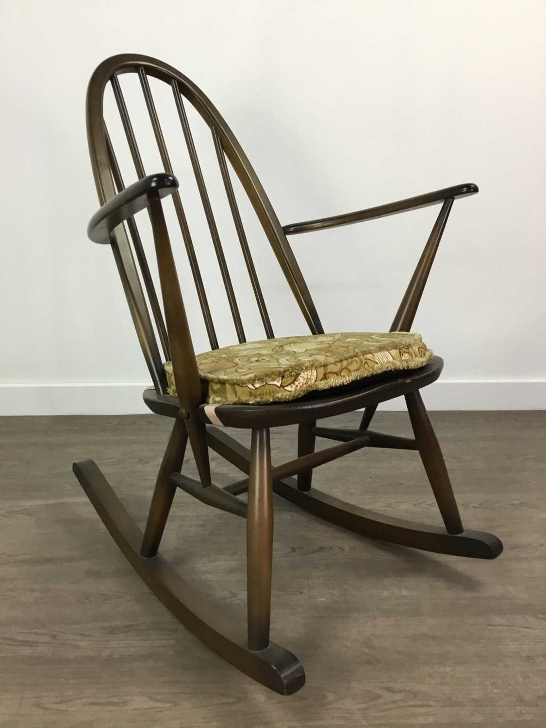 Lot 210 - AN ERCOL ROCKING CHAIR