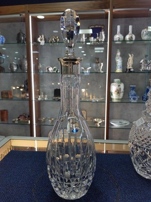 Lot 179 - THREE SILVER COLLARED CLEAR GLASS DECANTERS