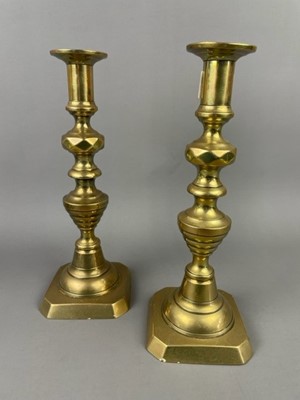 Lot 251 - A 1970'S LAVA LAMP AND A PAIR OF BRASS CANDLESTICKS