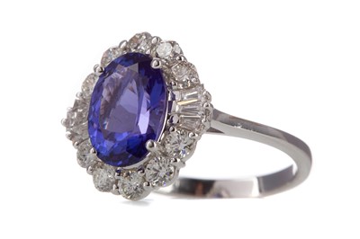 Lot 697 - A CERTIFICATED TANZANITE AND DIAMOND RING
