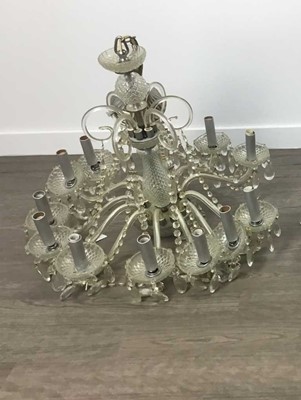 Lot 317 - A GLASS CHANDELIER WITH TWELVE SCROLLING BRANCHES