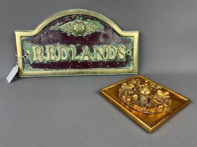 Lot 340 - A CAST AND PAINTED HOUSE NAME SIGN, ALONG WITH FOUR WALL PLAQUES