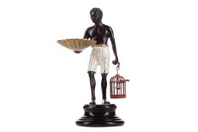 Lot 819 - A BRONZED AND COLD PAINTED FIGURE OF A BLACKAMOOR