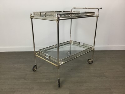 Lot 364 - A CHROME AND GLASS DRINKS TROLLEY