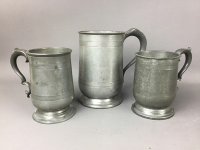 Lot 405 - A LOT OF THREE VICTORIAN MOULDED JUGS AND THREE PEWTER MUGS