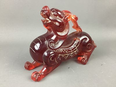 Lot 410 - A MODERN CHINESE IMITATION CHERRY AMBER SHISHI