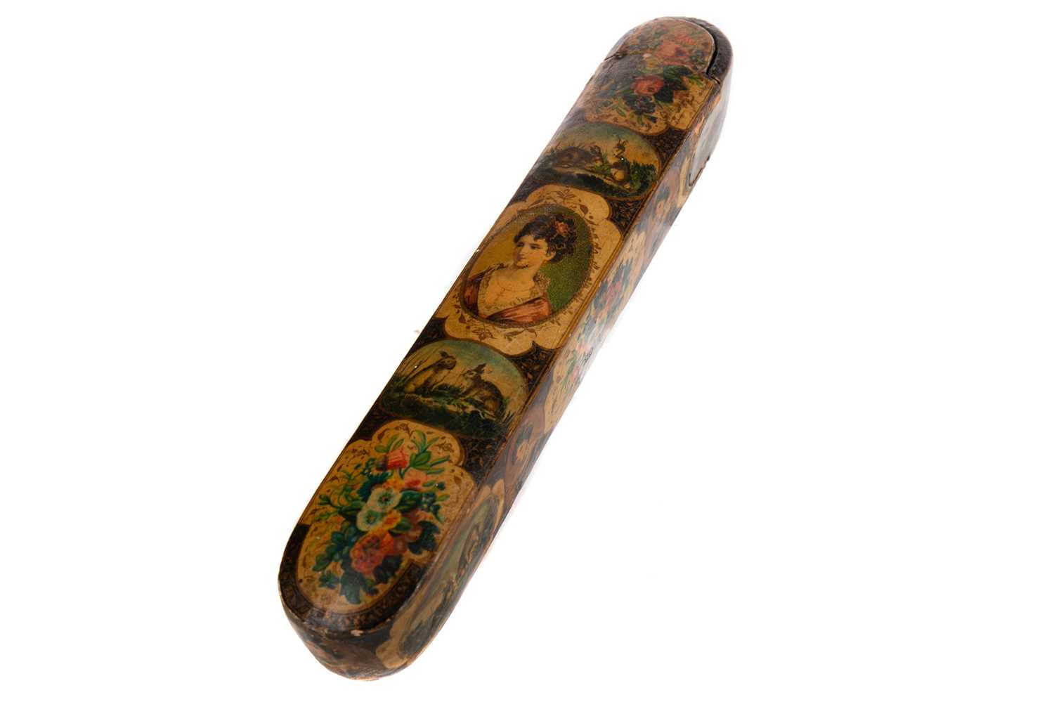 Lot 1010 - A QAJAR PAPIER MACHE QALAMDAN (PEN BOX)