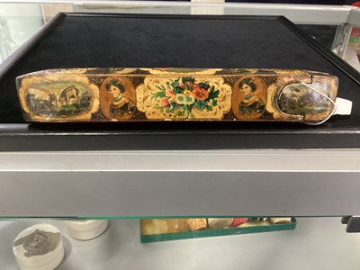 Lot 1010 - A QAJAR PAPIER MACHE QALAMDAN (PEN BOX)