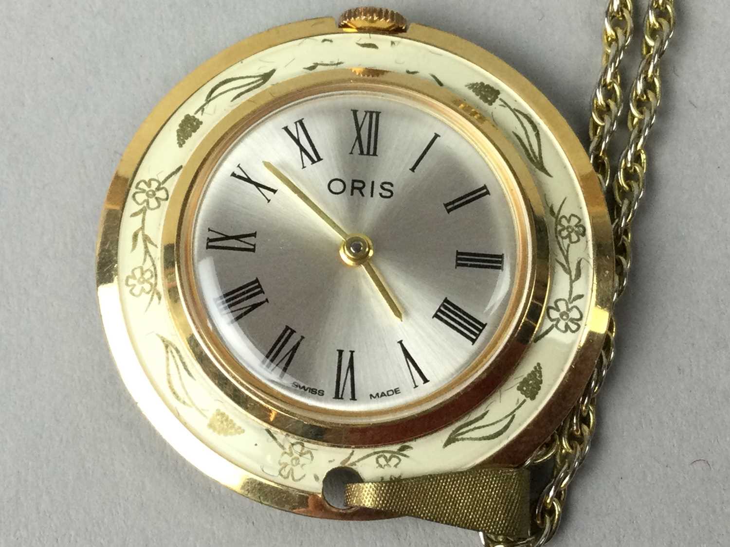 Lot 376 A LADY S PENDANT WATCH BY ORIS AND A FOB