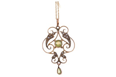 Lot 443 - AN EDWARDIAN  PERIDOT AND SEED PEARL HOLBEIN