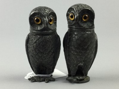 Lot 76 - A PAIR OF CAST PEWTER PEPPERETTES