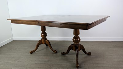 Lot 43 - A 20TH CENTURY EXTENDING DINING TABLE AND TEN CHAIRS