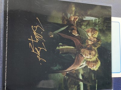 Lot 1009 - TWENTY SIGNED LORD OF THE RINGS PROMOTIONAL PHOTOGRAPHS