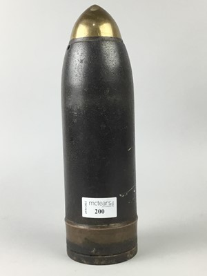 Lot 200 - A VINTAGE SHELL CASING