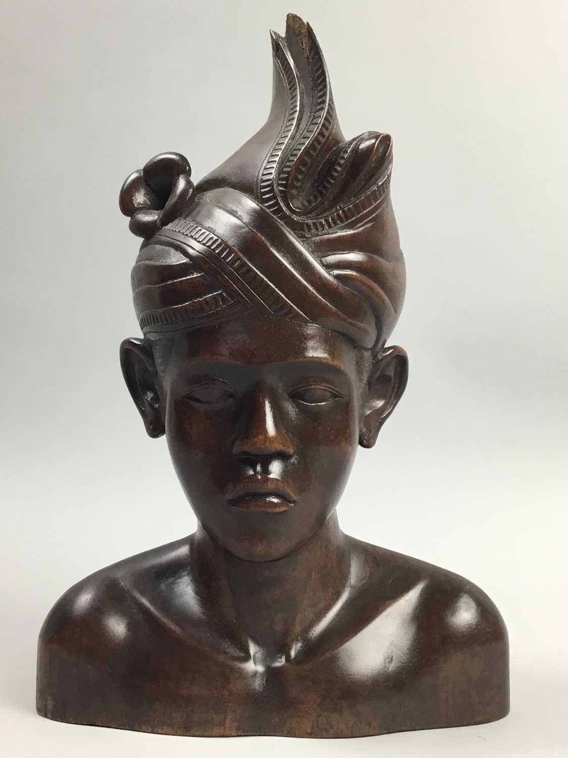 Lot 58 - TWO BALINESE CARVED WOOD FIGURAL BUSTS