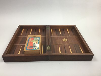 Lot 125 - A CHESS BOARD AND PIECES