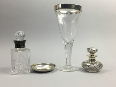 Lot 46 - A SILVER MOUNTED WINE GLASS, SILVER MOUNTED BOTTLES AND SILVER DISH