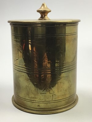Lot 40 - A WWI PERIOD TRENCH ART TOBACCO JAR, A MONEY BANK AND ASSORTED BRASS WARE