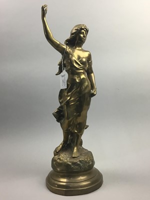 Lot 241 - A BRASS FIGURE OF A FEMALE AND A MANTLE CLOCK