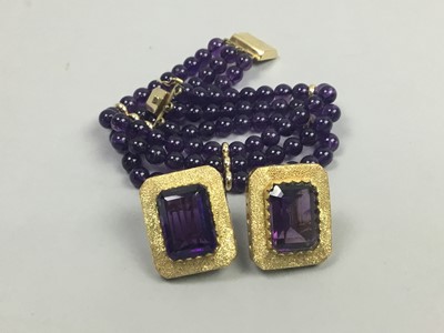 Lot 67 - AN AMETHYST COLOURED SUITE