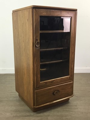 Lot 274 - AN ERCOL DISPLAY CABINET