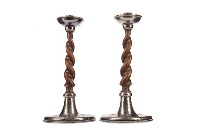 Lot 276 - A PAIR OF ARTS & CRAFTS OAK SPIRAL TURNED CANDLESTICKS