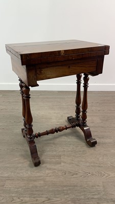 Lot 828 - A 19TH CENTURY ROSEWOOD FOLD OVER GAMES TABLE