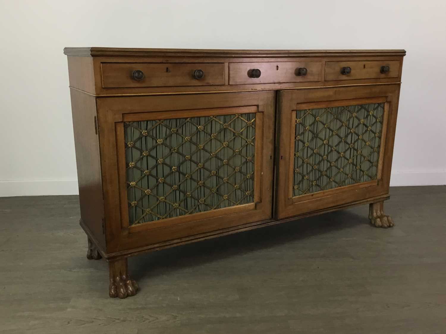 Lot 829 - A MAHOGANY SIDE CABINET OF REGENCY DESIGN