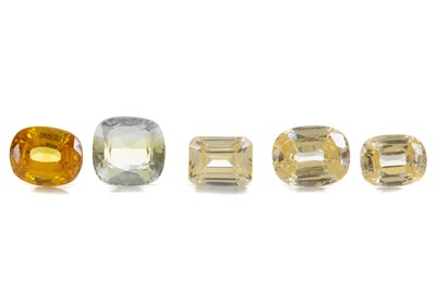 Lot 513 - **FIVE UNMOUNTED YELLOW SAPPHIRES