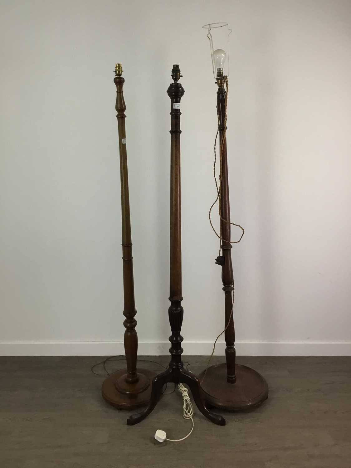 Lot 277 - A MAHOGANY STANDARD LAMP ALONG WITH TWO OTHERS