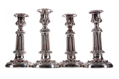 Lot 839 - A SET OF FOUR SILVER PLATE ON COPPER TELESCOPIC CANDLESTICKS