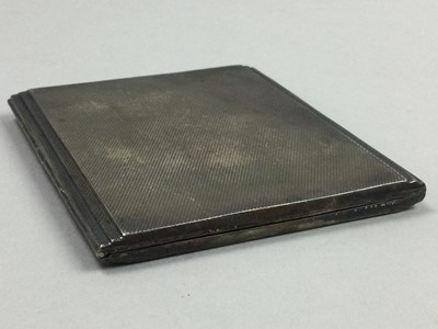 Lot 310 - AN ENGINE TURNED SILVER CIGARETTE CASE