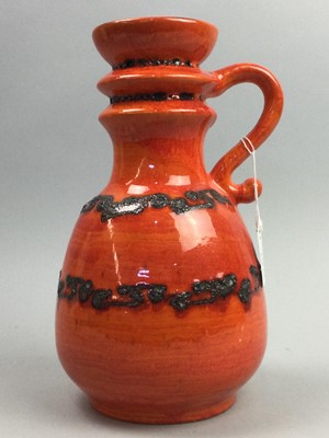 Lot 148 - TWO WEST GERMAN POTTERY JUGS AND A VASE