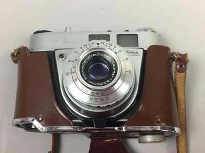 Lot 151 - TWO CAMERAS AND A CROP