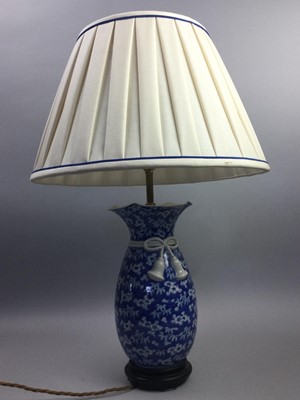 Lot 323 - A PAIR OF CHINESE BLUE AND WHITE VASE LAMPS