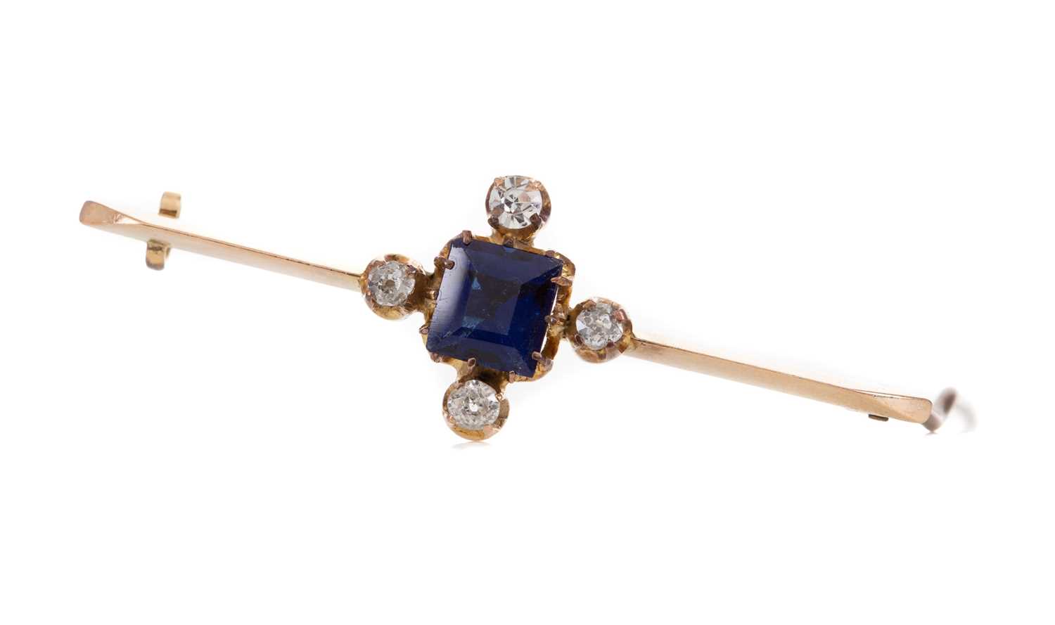 Lot 1107 - A BLUE PASTE AND DIAMOND BAR BROOCH