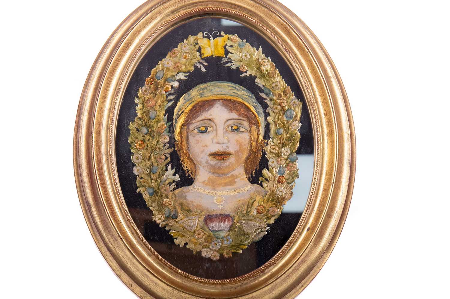 Lot 503 - A GERMAN REVERSE PAINTED MIRROR